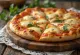 Reykt provola ostapizza með mozzarella og basilíku